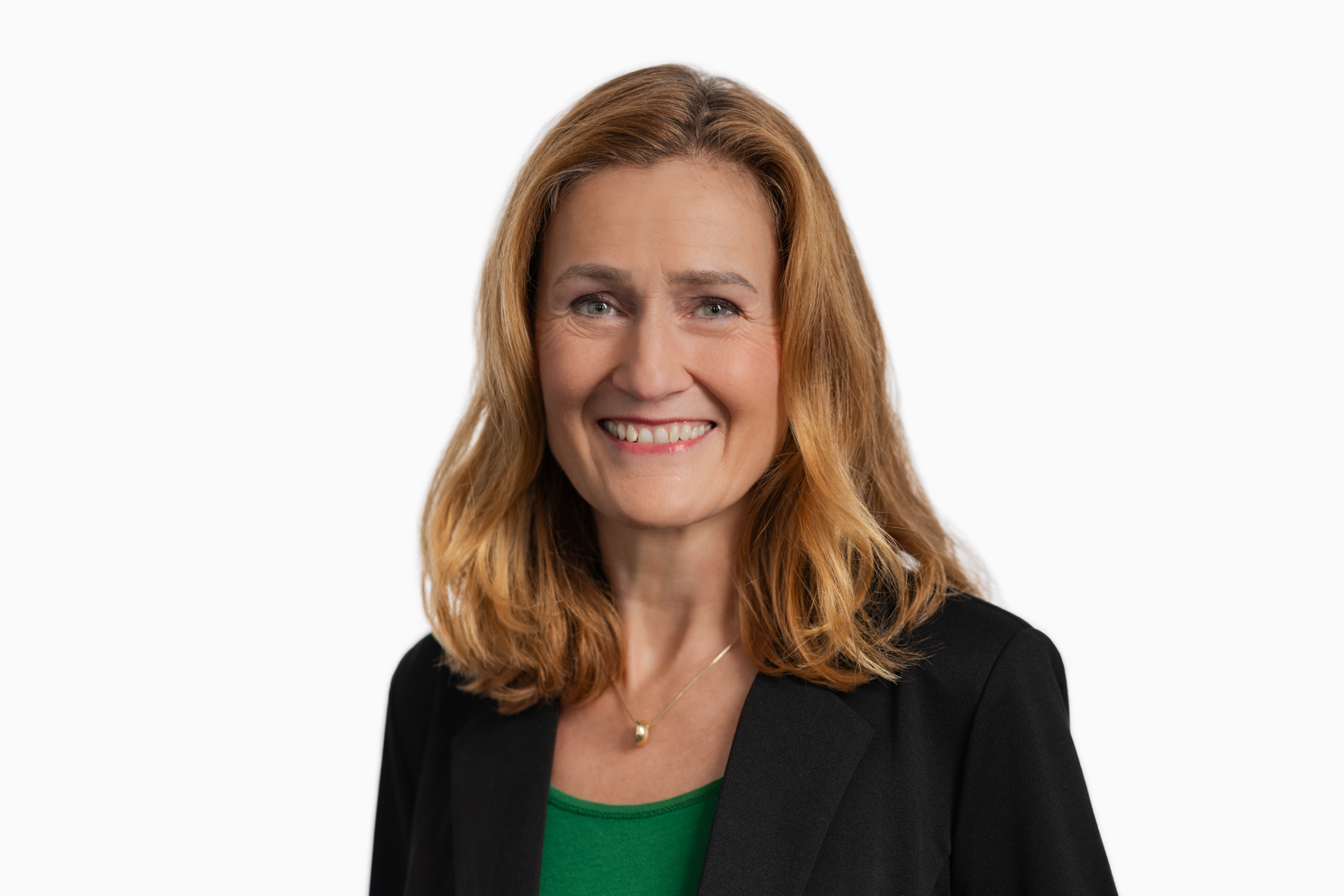 Zu sehen ist Finanzministerin Dr. Silke Schneider, die in die Kamera lächelt.